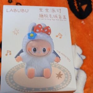White and Pink Stuffed Animal Toy